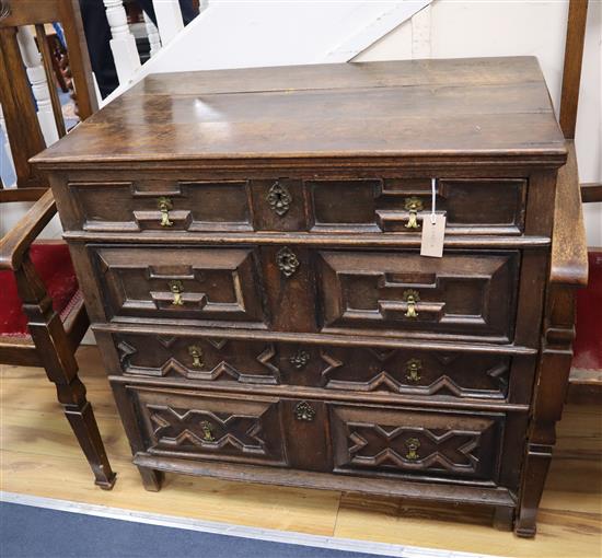 A 17th century oak geometric moulded chest of drawers W.90cm